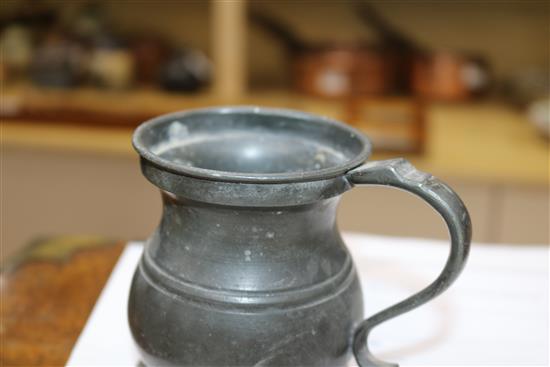 Five graduated pewter tankards, tallest 17cm